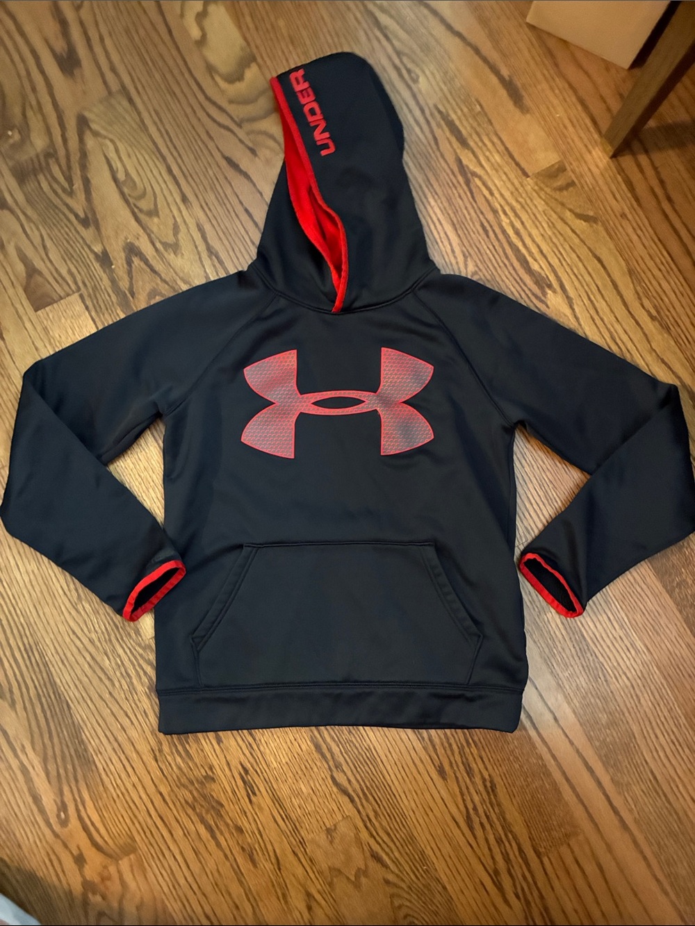 Under Armour Black Hoodie with Red Logo  Trim size youth large